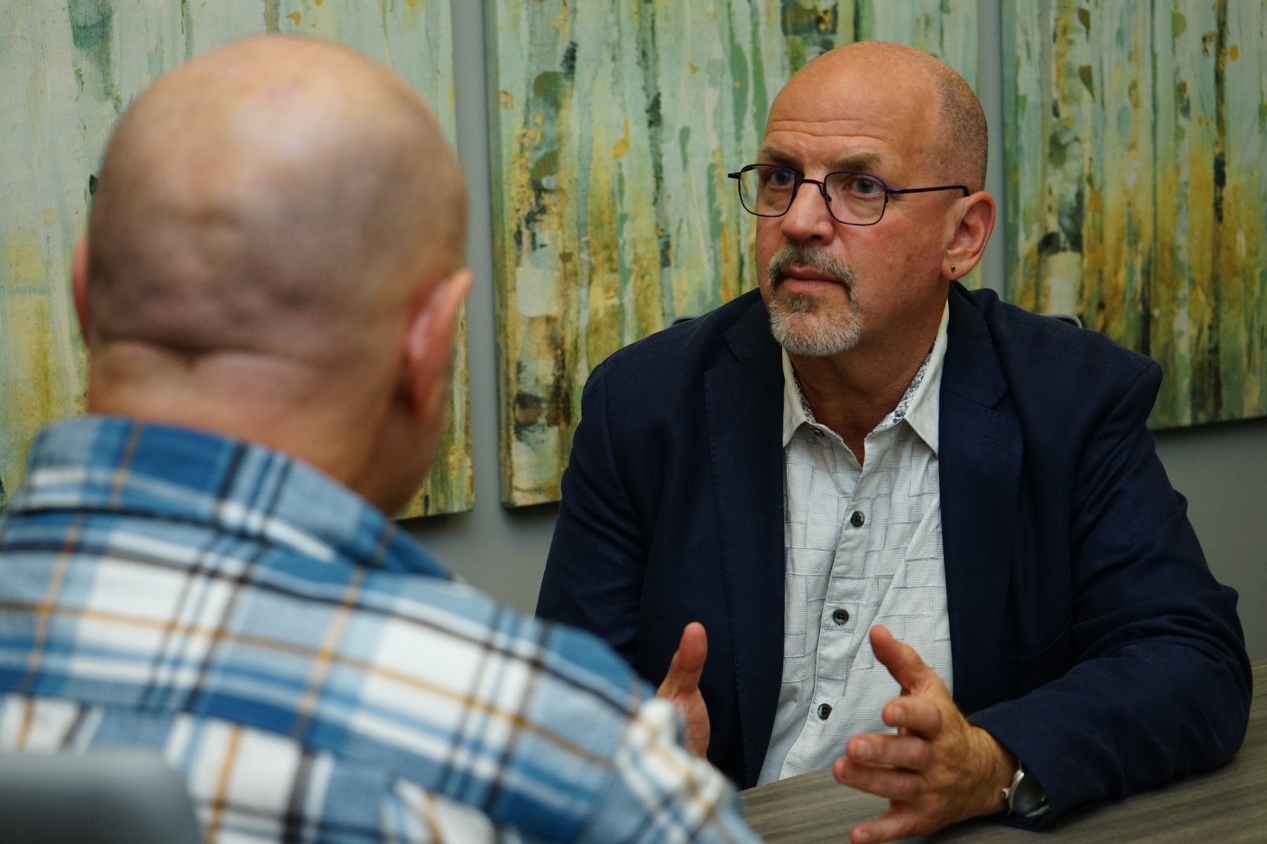 Dr. Fred Moss in supervision conversation
